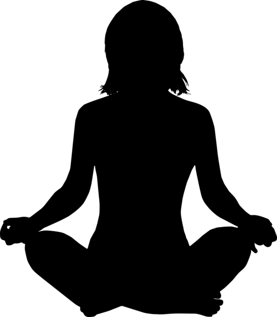 Silhouette of a woman in a yoga position